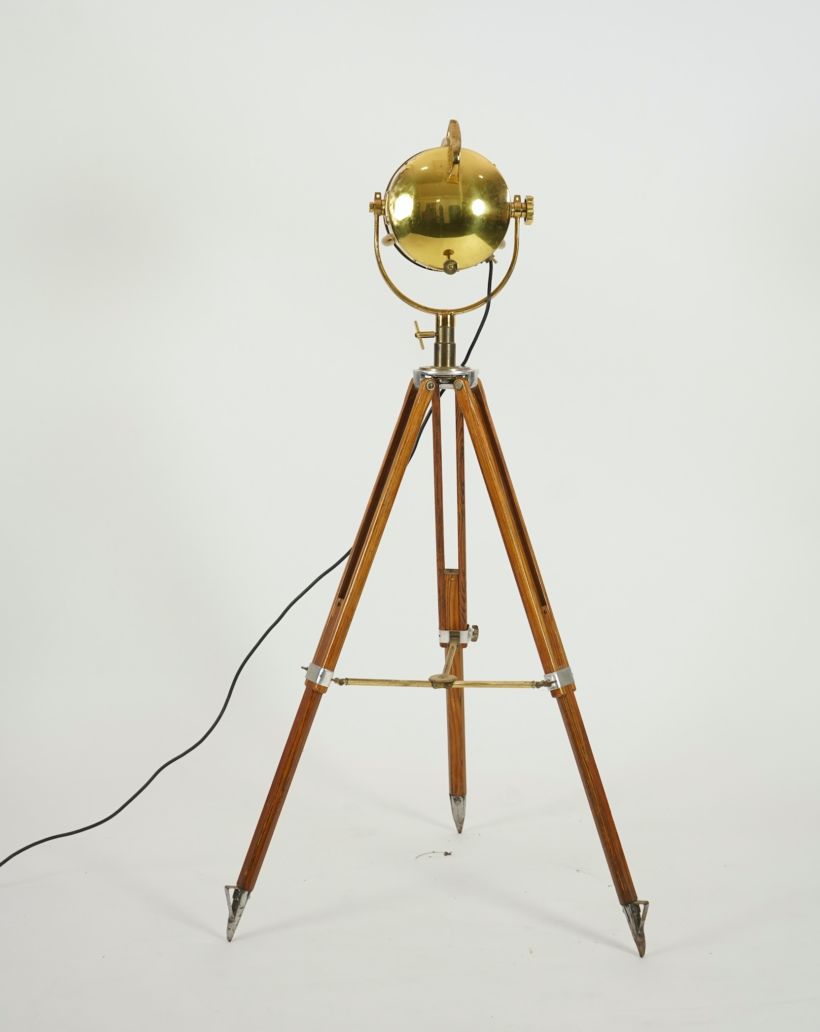 A mid 20th century polished brass marine searchlight